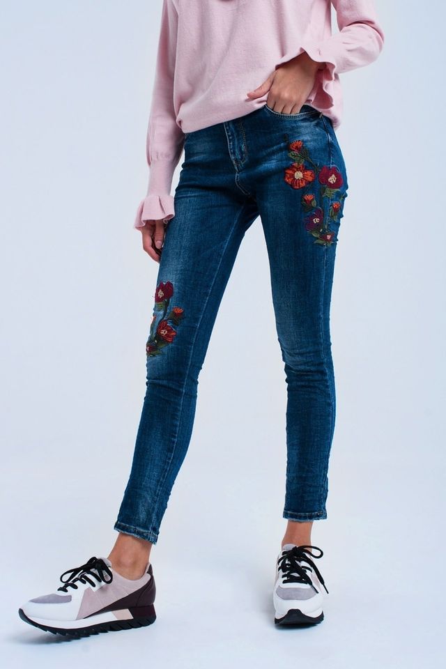 JEANS SKINNY CON FLORES
